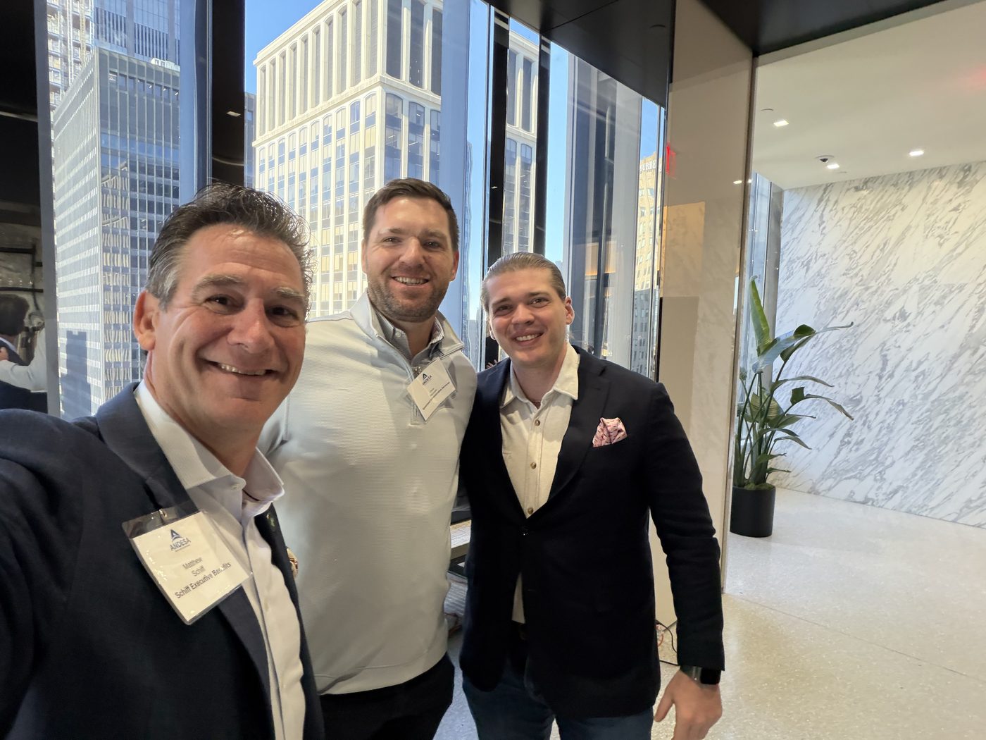 Matt Schiff with two advisors at an industry conference