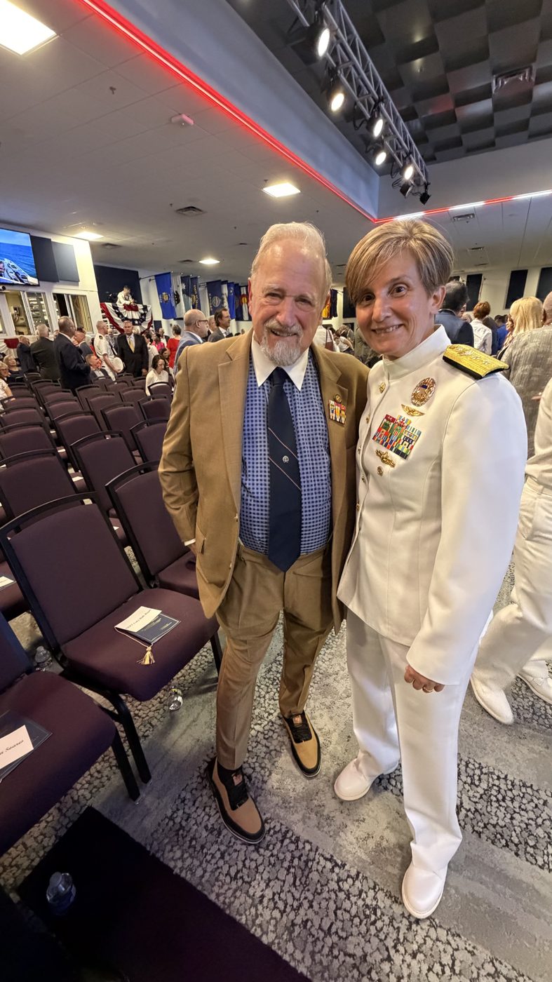 Bud Schiff with a Navy Rear Admiral in dress whites