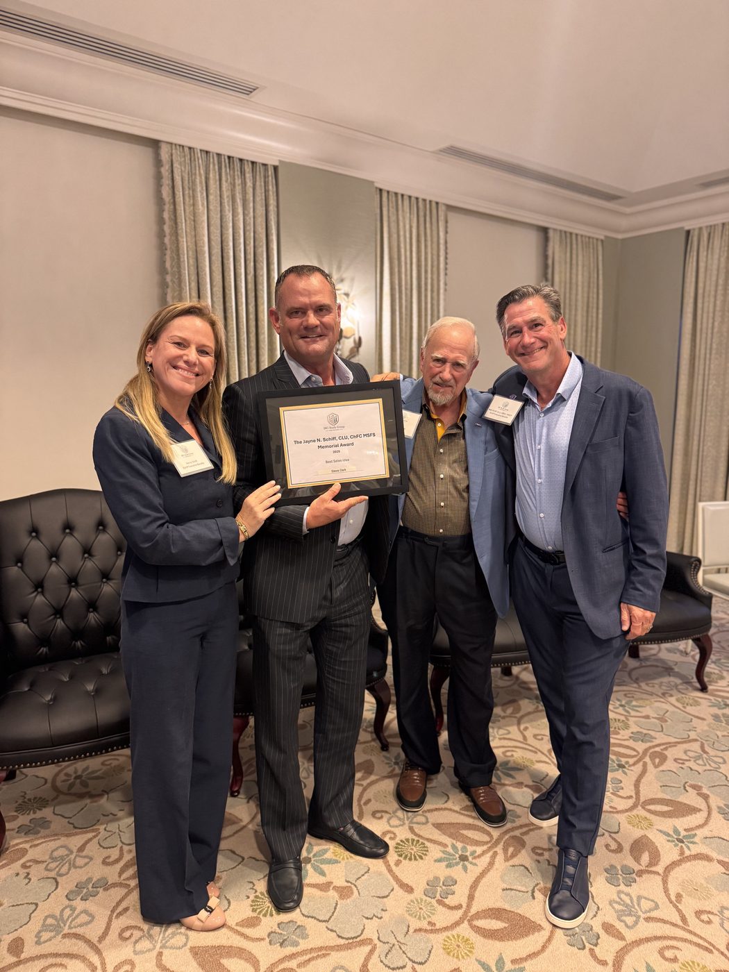 An award being presented at an industry meeting